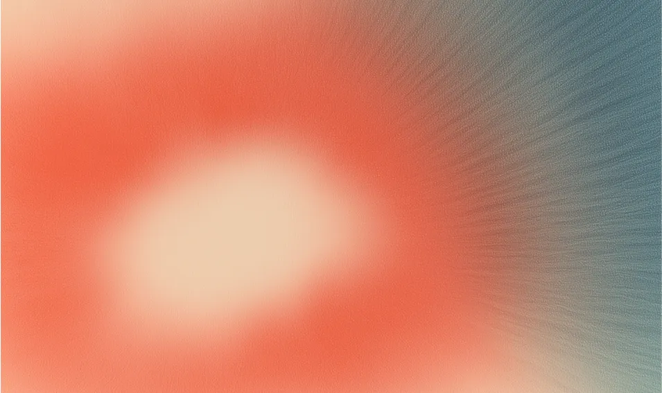 Abstract radial gradient with a bright central glow fading to orange and blue-green edges.